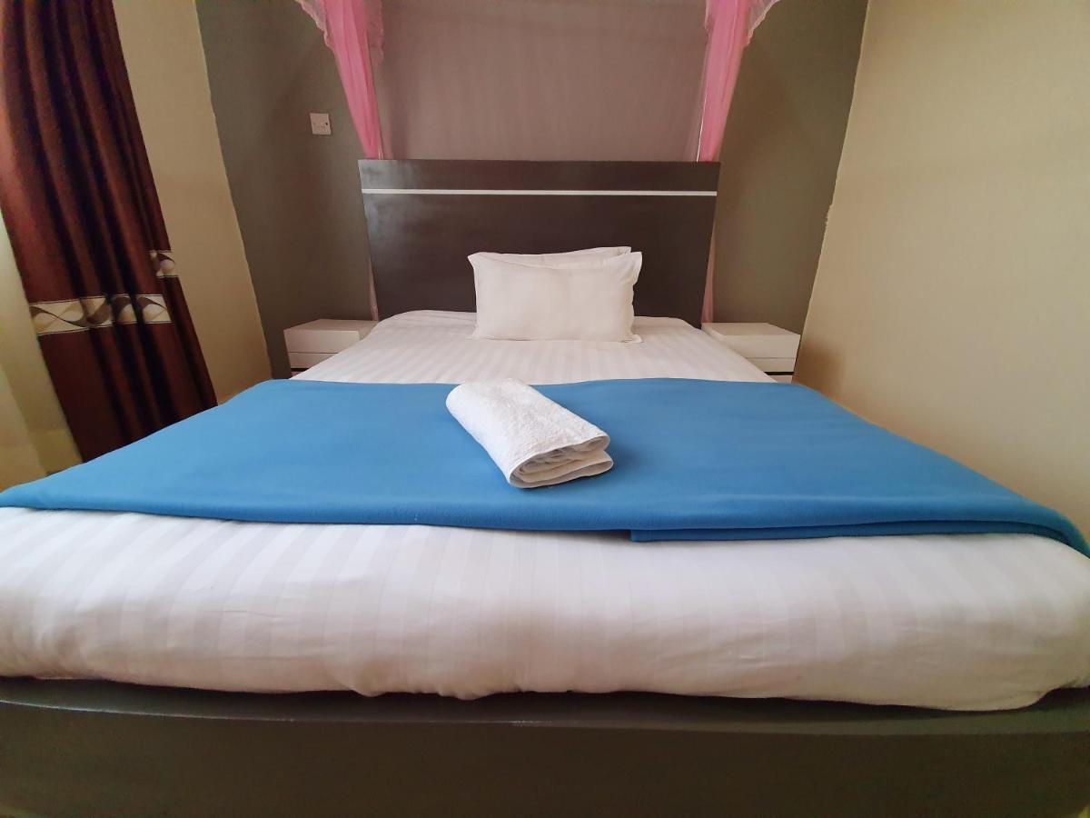 Airport Unique Hotel Entebbe Esterno foto